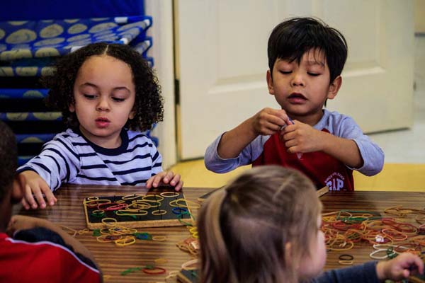 kids doing activities at The Learning Center